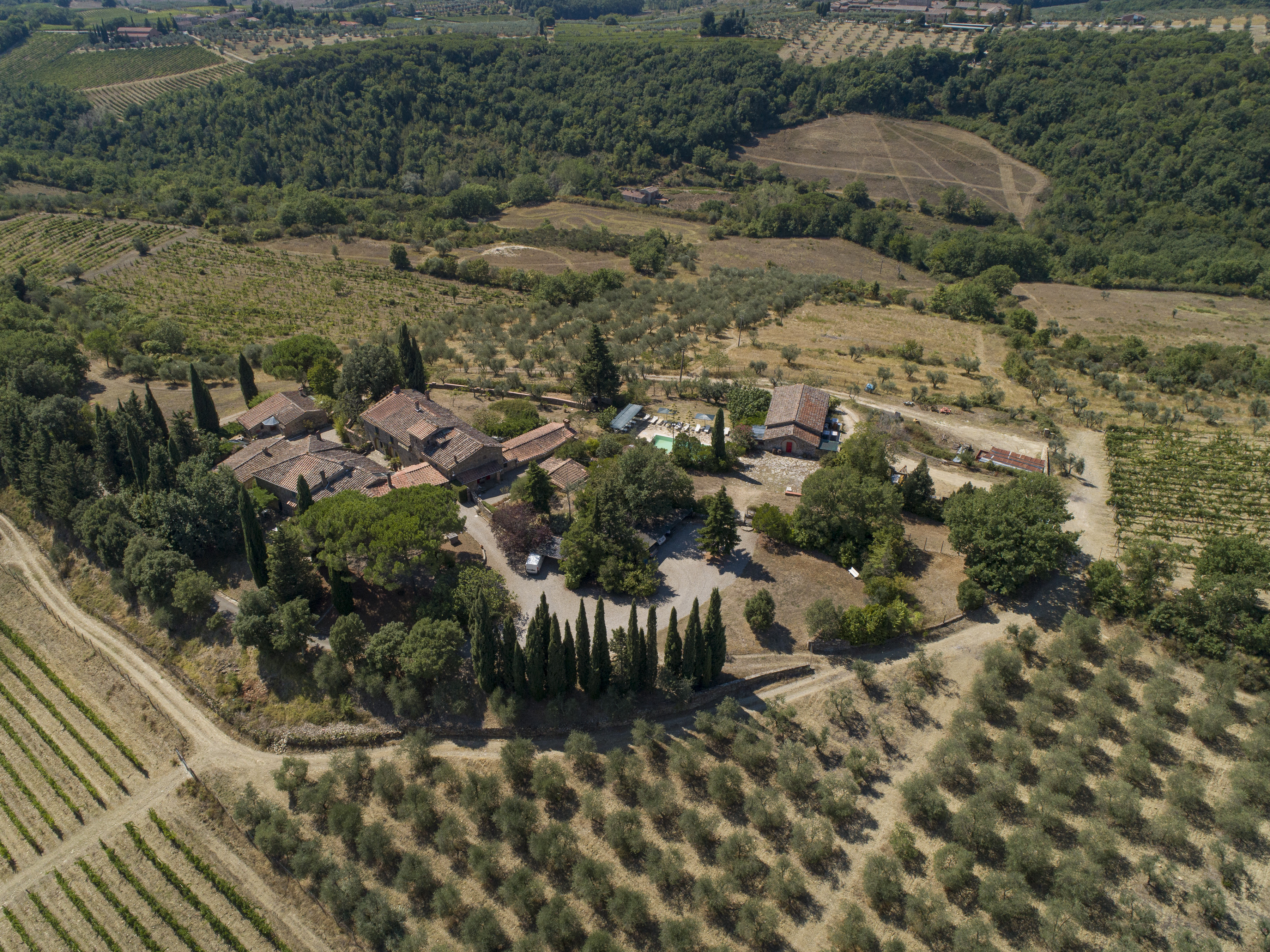 REAL ESTATE: Agritourism and Wine Estate: a borgo in the hills of Chianti Classico for sale.